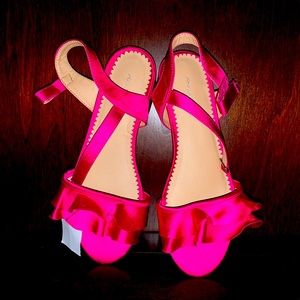 Fuchsia pink sandals.